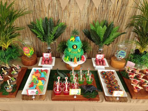 Dinosaur dessert table Dinosaur Themed Birthday Party Table, Dinasour Birthday Dessert Tables, Dinosaur Candy Table Ideas, Dino Candy Table, Dino Party Dessert Table, Dinosaur Party Dessert Table, Dinosaur Birthday Dessert Table, Dinosaur Dessert Table Ideas, Dino Dessert Table