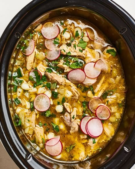 Slow Cooker Chicken Posole Recipe (Meaty and Rich) | The Kitchn Crock Pot Posole Chicken, Posole Recipe Chicken Crock Pot, Chicken Posole Recipe Crock Pots, Crock Pot Pozole Pork, Chicken Pasole, Slow Cooker Chicken Posole, Slow Cooker Pozole, Chicken Posole Recipe, Slow Cooker Posole