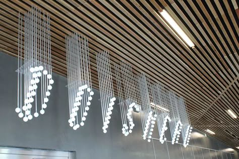 Centre culturel - Meudon on Behance Suspended Signage, Environmental Graphics Signage, Wayfinding Signage Design, Retail Signage, Wayfinding System, Signage Display, Environmental Graphic Design, Logo Wall, Wayfinding Signage