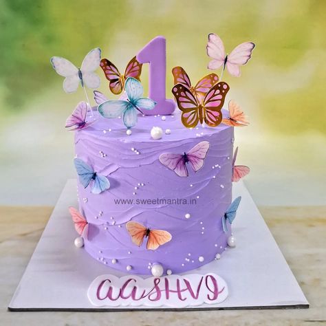 Butterfly theme whipped cream cake for girls 1st birthday in Pune . . . #butterflycake #butterfliescake #butterflies #1stbirthdaycake #customisedcakefordaughter #inpune #cakefordaughter #cakeforgirls #whippedcreamcake #bestcakesinpune 🚗 Delivery in Pune, PCMC ☎️ Contact 7058714701 🎂 Customized Designer cakes since 2013! [butterflycakepune, 1stbirthdaycakepune, butterflythemecakepune, customcakefordaughterinpune, customcakeforgirlsinpune, customcakeforboysinpune, kidsbirthdaycustom... Butterfly Birthday Cake For Girls Kids, Butterfly Cake Ideas For Kids, 6th Birthday Cake Girl, Cake For 1st Birthday, Marvel Birthday Cake, Butterfly Theme Cake, One Year Birthday Cake, Whipped Cream Cake, Colorful Birthday Cake