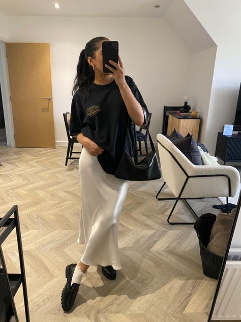 Cream midi skirt, chunky loafers, oversized black t shirt Chunky Loafers Midi Skirt, Silk Skirt And Loafers, Midi Skirt And Loafers Outfit, Chunky Loafers Skirt Outfit, Midi Skirt With Loafers, Loafers With Skirt, Winter Style 2023, Cream Midi Skirt, Oversized Black T Shirt