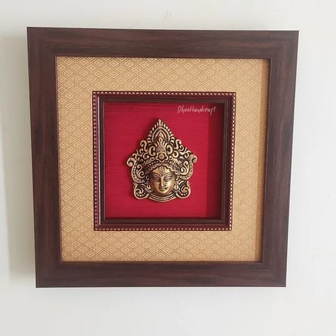 Goddess Durga Maa Brass Idol Framed on Raw Silk - W 12 in x H 12 in - Home Décor - Wall Décor | Handcrafted Brass Wall Decor Size of the frame : 12 inches x 12 inches Weight: 1 kilogram with the frame. For order and inquiry please contact us via whatsapp to 9500161934 We do shipping internationally!!! #homedecor #brassdecor #handicrafts #brass #brasshomedecor #BrassIdol #walldecor #wallhanging #walldecoration #traditionalhomedecor #traditional Durga Face, Brass Wall Decor, Indian Wall Hanging, Wall Colours, Goddess Durga, Ethnic Home Decor, Art Decor Diy, Durga Maa, Durga Goddess