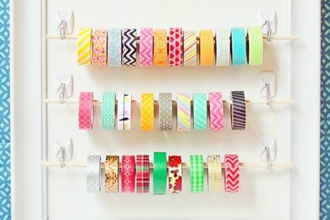 25 Brilliant Ways to Use Command Hooks | TipHero Washi Tape Wall Decor, Washi Tape Wall, Craft Room Organization Diy, Washi Tape Storage, Tape Storage, Organize Craft Supplies, Command Hooks, Kids Art Supplies, Diy Craft Room