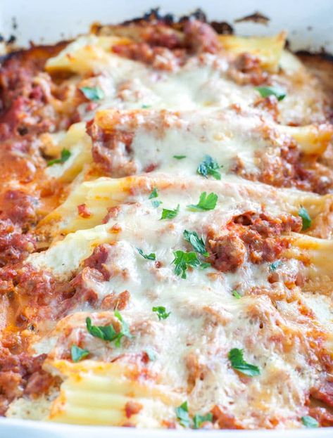 Stuffed Manicotti with Sausage - Food Lovin Family Sausage Stuffed Manicotti Recipe, Manicotti Filling Recipe, Manicotti Recipe Sausage, Manicotti Recipe Beef, Stuffed Manicotti With Meat, Meat Manicotti Recipe, Italian Sausage Manicotti, Sausage Stuffed Manicotti, Sausage Manicotti Recipe