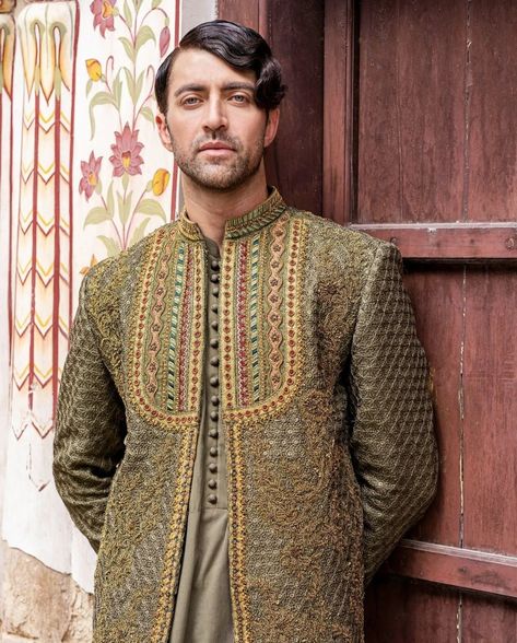 Giving all the Maharaja vibes, Aimal Khan wears our hand-crafted olive green prince coat paired with a Rajasthani-style flaired kurta and chooridar pajamas. To find out how you can get this look, contact us at +923331213479/ +923331213177 or visit our website: https://theworldofhsy.com/. Green Prince Coat, Raw Silk Kurta, Fashion Advisor, Prince Coat, Linen Pajamas, Silk Kurta, Kurta Pajama, Linen Color, Luxury Bridal