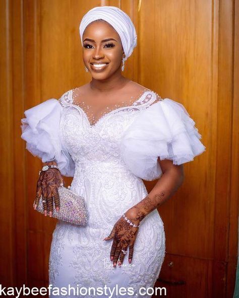 Best White Lace Gown Styles for Wedding Guests in 2023 - Kaybee Fashion Styles White Lace Gown Styles, Lace Gown Styles For Wedding, White Lace Dress Styles Nigerian, Lace Dress Styles Ghana, Nikkah Ceremony, Lace Styles For Wedding, White Lace Gown, Lace Dress Classy, Structured Corset