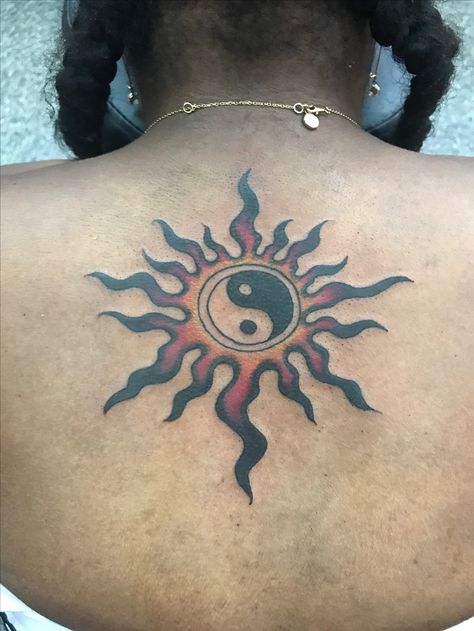 Black colorful ying yang sun back tattoo Yin Yang Tattoo Black Women, Ying Yang Tattoo Black Women, Ying Yang Tattoo Moon And Sun, Ying Yang Sun Tattoo, Spiritual Awakening Tattoo, Ying Yang Back Tattoo, Ying And Yang Tattoo, Yin Yang Sun Tattoo, Yin Yang Fire And Water Tattoo