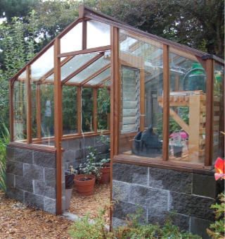 Greenhouse with brick base. looks better than an all glass one but would it be as effective? Cinder Blocks Diy, Greenhouse Diy, Diy Greenhouse Plans, Cinder Blocks, Greenhouse Shed, Backyard Greenhouse, Small Greenhouse, Diy Blocks, Greenhouse Plans