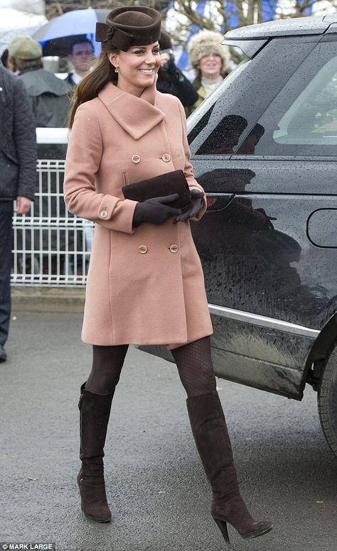 Duchess-Cambridge enjoyed a day out at the Cheltenham Festival.  She paired her peachy coat - one that she had worn previously before her marriage to William - with all-brown accessories - the £240 Betty Boop hat from Lock & Co, brown Rumba boots from Aquatalia by Marvin K, £488, and a matching brown clutch bag Ducesa Kate, Moda Kate Middleton, Cheltenham Races, Duchesse Kate, Düşes Kate, Princesse Kate Middleton, Brown Tights, Looks Kate Middleton, Estilo Kate Middleton