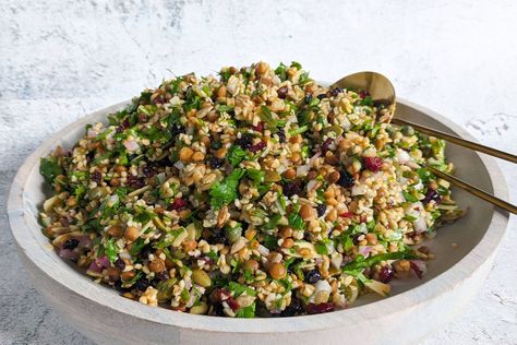 With so many textures and flavours, this vibrant Cypriot salad is packed full of ancient grains, nuts, seeds and dried fruits, all finished off with a zingy caper lemon dressing. Custard Croissant, Crunchy Salad Recipes, Croissant Pudding, Christmas Coconut, Grain Salad Recipes, Filling Salad Recipes, Wreath Recipe, Christmas Pasta, Pumpkin Spinach