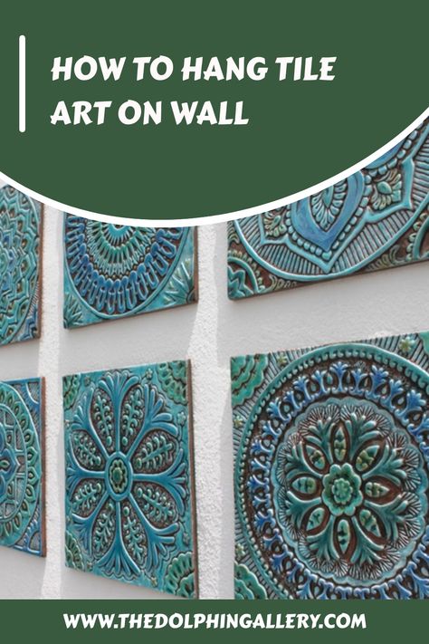 Discover how to make a beautiful statement with tile art! Learn the best way to hang it on your wall, and get design tips for making the most of your space. Tile Frames Wall Art, How To Hang Ceramic Tiles On Wall, Acrylic Paint Pouring On Ceramic Tiles, How To Make Coasters Out Of Ceramic Tiles, Ceramic Wall Hanging Art Tiles, Tile Art Projects, Hallway Wall Art, Creative Wall Art, Tiles For Wall