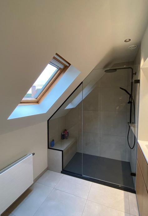 Attic En Suite Small Bathrooms, Slanted Ceiling Ensuite, Attic Conversion Bathroom, Bath Under Velux Window, Small Bathroom Ideas Sloped Ceiling, Angle Ceiling Bathroom, Dormer Shower Ideas, Small Attic Ensuite, Loft Conversion Bedroom Master Suite Attic Bathroom