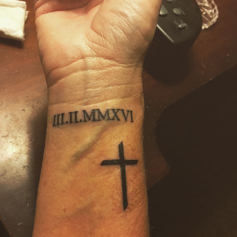 Roman numerals of the date I was saved accompanied by a simple cross Cross And Roman Numeral Tattoo, Tattoo Ideas Roman Numerals, Tattoo Ideas Roman, Memory Tattoo Ideas, Memorial Tattoo Ideas, Roman Numeral Tattoos, Cross Tattoo For Men, Simple Cross, Memorial Tattoo