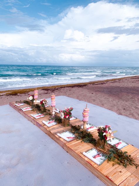 Boho themed beach picnic made from wood palettes, eucalyptus and flower arrangements, super cute party idea! Beach Picnic Party, Summer Beach Picnic, Picnic Party, Beach Picnic, Summer Beach, Flower Arrangements, Party Ideas, Super Cute, Table Decorations