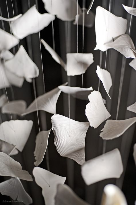 This image is a great example of lines because the edges, veins in the leaves, and the strings are lines. Ginkgo Leaves, Paper Leaves, Gongs, Sculpture Installation, Leaf Art, Land Art, Ceramic Clay, Hanging Art, Ceramic Sculpture