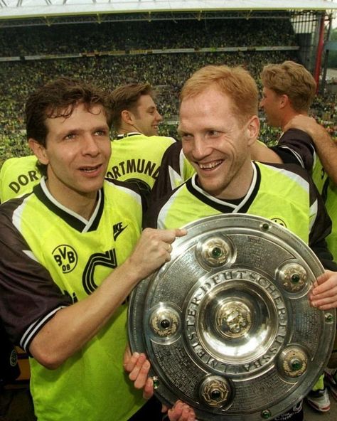 [Drop of the Week: Sammer & Dedê] This Wednesday, Dortmund has the opportunity to shine once again on the European stage. The timing is perfect to present you my two upcoming t-shirts featuring two icons of Borussia Dortmund: Matthias Sammer, the emblematic and victorious figure of Borussia Dortmund from the 90s, and Dédé, one of the favorites of BVB fans who has experienced it all. From the era of Jan Koller and Rosický to the golden generation of Hummels, Götze, and Lewandowski — Ce mercred... Jan Koller, Matthias Sammer, Retro Football, Borussia Dortmund, The Player, The 90s, To Shine, The Golden, Victorious