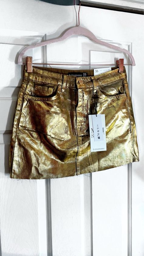 I got this gold foil denim mini skirt from Stradivarius for $49.90, and I’m obsessed 🤩✨ I can’t wait to style this with my fall outfits and holiday outfits this year 🎄🎁. I got it in a size 4! Follow my shop @FlyFierceFab on the @shop.LTK app to shop this post and get my exclusive app-only content! #liketkit #LTKHoliday #LTKfindsunder100 #LTKfindsunder50 @shop.ltk https://liketk.it/4k6h6 Gold Mini Skirt Outfit, Gold Skirt Outfit, Foil Denim, Gold Skirts, Gold Mini Skirt, Gold Skirt, Nye Outfits, Gold Outfit, Miniskirt Outfits