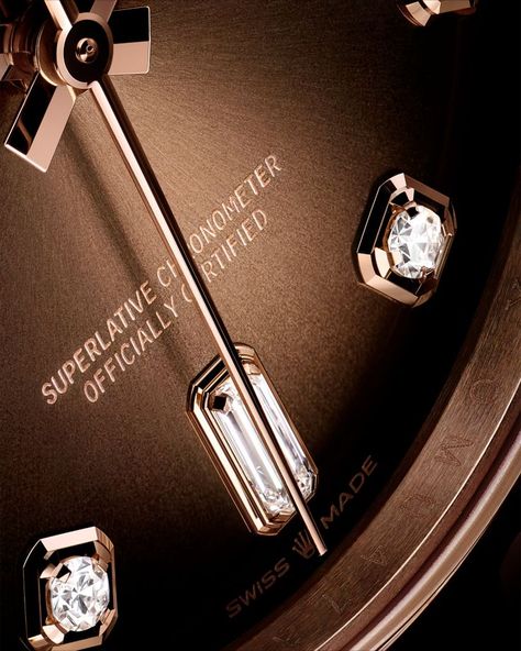 The brown ombré dial displays a concentric gradient that leads the eye from brown to black. This sunray-finish dial is coloured using PVD (Physical Vapour Deposition), with black lacquer then gradually added in circular motions. The dial is embellished with diamond hour markers in 18ct gold settings; the diamonds at 6 and 9 o'clock are baguette-cut, adding to the Day-Date 36’s sophistication. Black Lacquer, Brown Ombre, Rolex Day Date, O Clock, Rolex, Markers, Led, Gold, Black