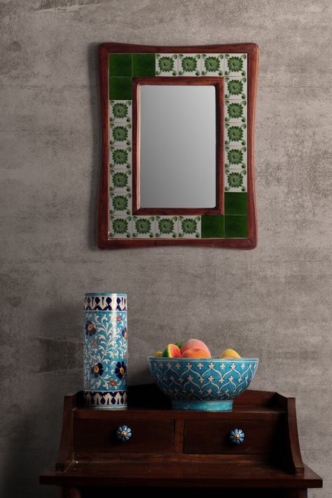 Green and White Tile Mirror in a brown wooden frame will add a touch of elegance to your home. Unique, hand painted tiled mirror stands over a foot tall and is perfect to complement your existing décor.  Wood : Sagwana This Mirror can be hang Horizontally as well as Vertically. This product has been made by hand, it may slightly vary in color from the picture. Delivery time is normally 4 to 6 business days. Note : We do not accept returns or exchanges unless the item you purchased is defective.W White Tile Wall, Tiled Mirror, Tile Mirror, Blue Tile Wall, Wall Hanging Mirror, Custom Mirror, Floral Tile, White Ceramic Tiles, Wooden Mirror Frame