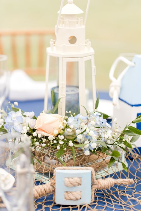 Nautical themed centerpieces designed by Jen-Mor Florist in Dover, Delaware.    www.jenmor.com Nautical Wedding Flowers, Nautical Wedding Centerpieces, Coastal Wedding Centerpieces, Nautical Theme Wedding, Nautical Centerpiece, Themed Centerpieces, Spring Wedding Outfit, Pink Wedding Centerpieces, Blue Wedding Centerpieces