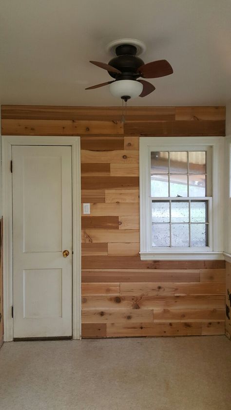 Cedar plank wall, using    fence pickets Cedar Fence Picket Wall, Cedar Fence Board Interior Walls, Plank Wall Ideas, Cedar Plank Wall, Cedar Fence Boards, Sunroom Decor, Cedar Fence Pickets, Cedar Walls, Fence Pickets