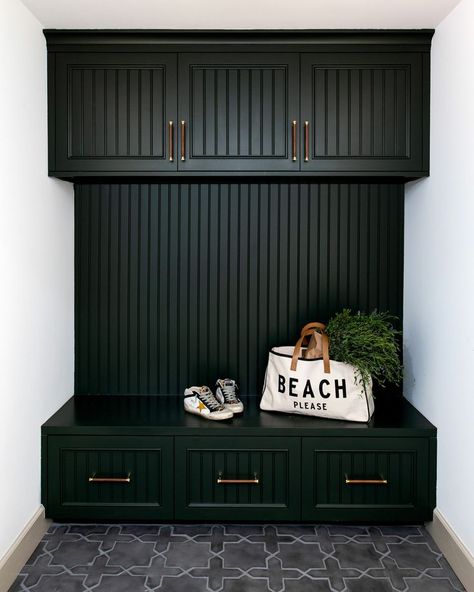 Millwork is painted Sherwin-Williams Jasper. Credit: HMS Interiors; photo by Lauren Pressey #mudroom #sherwinwilliams #jasper Sw Jasper, Dark Paint Colors, Malibu Home, Mudroom Ideas, Trending Paint Colors, Drop Zone, White Headboard, Coastal Modern, Green Paint Colors