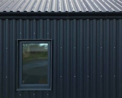 Metal-clad Eco Cottage puts a modern spin on Irish rural architecture | Inhabitat - Green Design, Innovation, Architecture, Green Building Exterior Metal Cladding, Eco Cottage, Corrugated Metal Siding, Black Cottage, Corrugated Steel, Metal Building Designs, Garden Cabins, Rural Architecture, Tin House