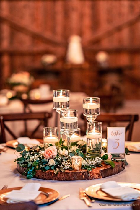 The team at Magnolia Bells always helps to make each of our client's weddings unique and beautiful. A lot of decor done at Magnolia Bells is very rustic chic, which can be done in so many different and beautiful ways. Click our link in bio to learn more about our venue and our decor packages! 📷Photo by @alexmoon Magnolia Centerpiece Wedding, Magnolia Centerpiece, Reclaimed Wood Ceiling, Floating Candle Holders, Rustic Wedding Table Decor, Gold Plates, Venue Inspiration, Magnolia Wedding, Floating Candle