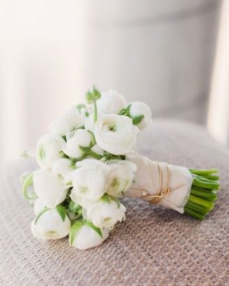 RANUNCULUS BOUQUET  The bridal bouquet consisted of white ranunculus and was finished with gold cord around the stems. Bouquet Pastel, Ranunculus Bouquet, Fall Barn Wedding, White Ranunculus, Restaurant Wedding, Boracay, Martha Stewart Weddings, White Bouquet, Bride Bouquets