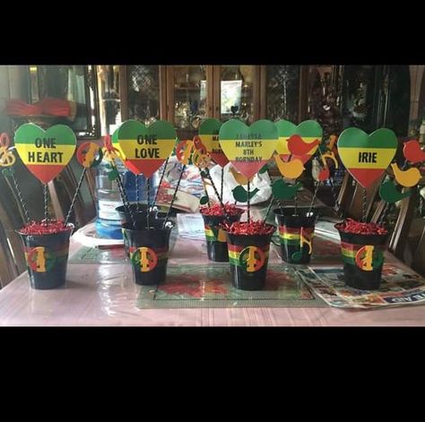 One love one heart reggae party hand made centerpieces Jamaican Party Decorations, Rasta Wedding, Caribbean Theme Party, Jamaica Party, Bob Marley Birthday, Party Theme Decorations, Rasta Party, Jamaican Party, Reggae Party