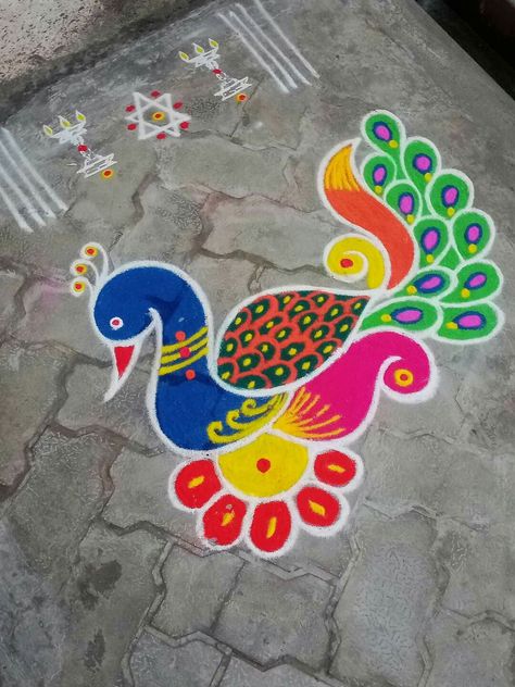 Peacock Rangoli Designs Easy Small, Scenery Rangoli, Levi Quotes, Creative Rangoli Designs, Margali Kolam, Diwali Theme, Sankranti Muggulu, Ganpati Rangoli, Simple Flower Rangoli