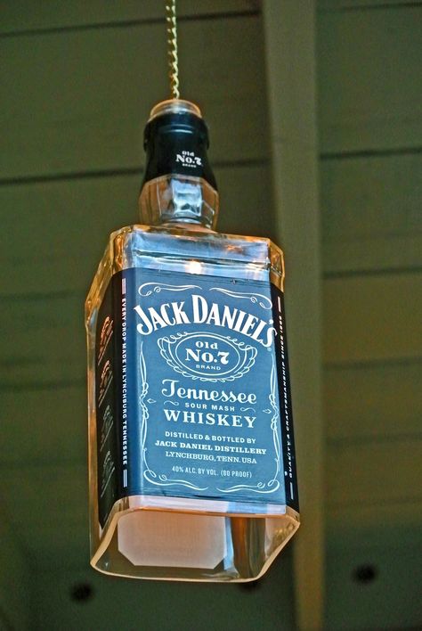 Jack Daniels Lights, Jack Daniels Candle, Jack Daniels Lamp, Diy Bottle Lamp, Alcohol Bottle Crafts, Covered Front Porch, Bottle Candle Holder, Jack Daniels Bottle, Whiskey Gifts