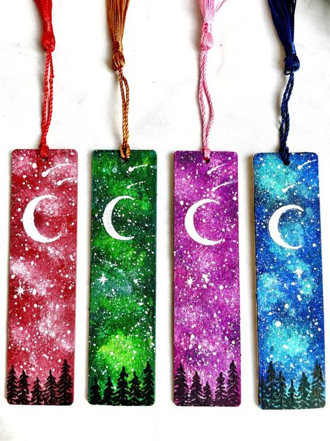 These constellation bookmarks will make tweens and teens want to pull out their books to study! Switch up the colors and go with jewel tones for a truly dreamy look. Diy Galaxy Painting, Galaxy Painting Tutorial, Craft Ideas For Teens, Galaxy Bookmark, Summer Painting Ideas, Bookmark Diy, Light Blue Paints, Fun Craft Ideas, Diy Galaxy