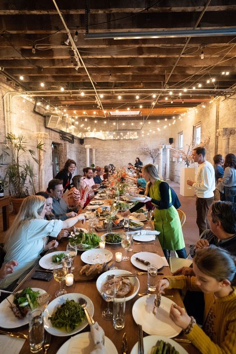 Long Table Restaurant, Warehouse Dinner Party, Long Table Dinner Party Indoor, Family Style Reception Dinner, Wedding Food Family Style, Family Restaurant Aesthetic, Long Table Dinner Party, Family Style Dinner Table, Family Style Dinner Wedding