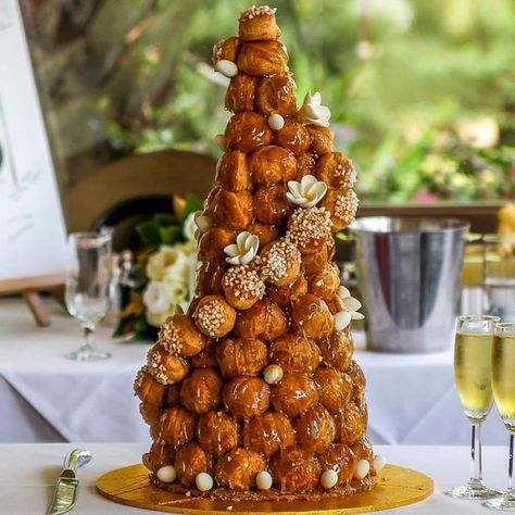 Croquembouche Is a Caramel-Wrapped Tower of Pastry Balls French Wedding Cake, French Wedding Cakes, Mixed Berry Muffins, Dessert Names, Famous Desserts, Sugar Dough, Berry Muffins, Berry Tart, Eat Something