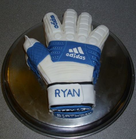 Goalkeeper's Gloves Cake Goalkeeper's gloves cake (Football/Soccer)Vanilla sponge with raspberry jam and buttercream... Goal Keeper Cake, Hermione Birthday, Cake Football, Football Birthday Cake, Hockey Goal, Goal Keeper, Soccer Birthday Parties, Football Cake, Soccer Birthday