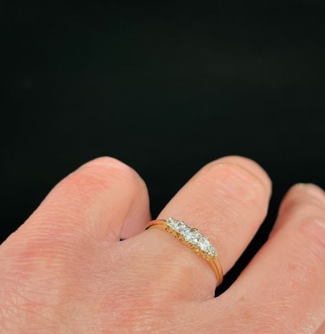 Just in, we have this ever so sweet circa 1920’s five stone Old European Cut Diamond ring. The five Old European Cut Diamonds total 0.36ct, and are claw set graduated from the centre in 18K yellow gold on a fine band. This ring can be bought as a wedding band, an anniversary ring, push present, for a birthday, or a graduation. It can also be bought to add to an already existing ring stack 🫠💫 it is such a sweet antique ring. DM us for enquiries 🤍 _________________________________________... European Cut Diamond Ring, Push Present, Push Presents, Antique Ring, Ring Stack, European Cut Diamonds, Anniversary Ring, Antique Rings, Stacking Rings