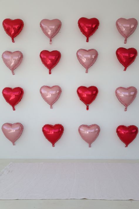 #valentines #valentinesdaydecorations #minisession #valentinesday #inspo #hearts #whitewall Heart Balloon Wall Photoshoot, Valentine’s Day Balloon Heart Wall, Galentines Balloon Wall, Heart Balloon Wall Backdrop, Photo Wall Valentines Day, Valentines Selfie Station, Valentines Balloon Wall, Galentines Balloon Garland, Galentines Photoshoot Backdrop