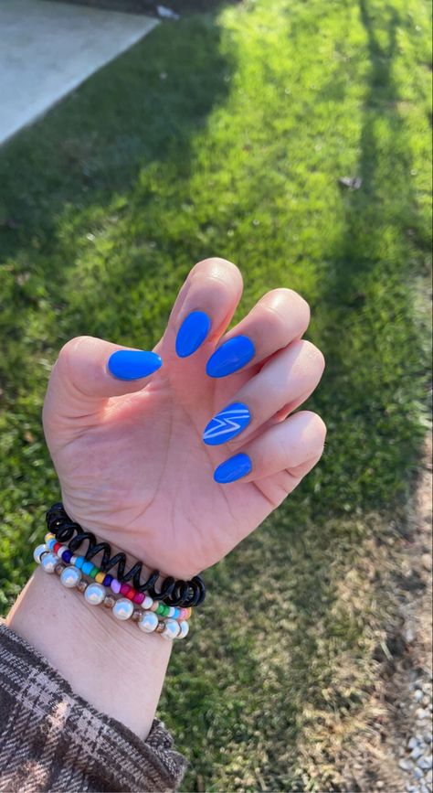 Lightning Bolt Nails Blue, Blue Nails With Lightning Bolt, Megan Nails, Tennessee Nails, Fun Manicure Ideas, Bolt Nails, Lightning Bolt Nails, Lightning Nails, Neon Blue Nails