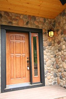 River Rock - Waterton | www.kodiakmountain.com | Flickr River Rock House, House Exterior Rustic, Entry Porch Ideas, Rock House Exterior, River Rock Ideas, Rock Siding, Cabin Siding, Rustic Outdoor Spaces, Stone Veneer Exterior