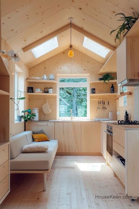 This sleek design optimizes space and functionality, featuring clean lines and a streamlined layout. Tiny House Kitchen Layout, Tiny House Kitchen Storage, One Wall Kitchen, Kitchen Layout Ideas, Minimalist Cabinet, Tiny House Inspiration, Tiny House Kitchen, Mobil Home, Tiny House Interior