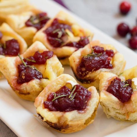 There's a reason why this recipe is duplicated over and over, it's just that good! Cranberry Brie Bites are a quick and easy appetizer recipe that looks like you spent all day. It's mature flavors will waken your tastebuds and you will go back for more. But don't take my word for it. Make it and take it to your next party, don't go empty handed. Cranberry Brie Bites will be devoured. #easyrecipe #easyappetizer #cranberry #cranberrybrie #recipes #recipe #food #Foodie #feedfeed #instagood Brie Appetizers, Eat Appetizers, Cranberry Appetizer, Raclette Originale, Galette Des Rois Recipe, Cranberry Bites, Cranberry Brie Bites, Goblin Market, One Bite Appetizers