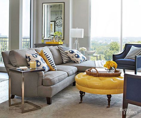 Decorating with vibrant colors can be intimidating. Learn how to properly incorporate bright, bold colors in your home with our tips and tricks. Whether you add bright pieces of furniture or paint your walls a bold color, our tips will help you decorate with confidence. #homedecor #boldcolors #homedecortips Redecorating Ideas, Gray Walls, Yellow Living Room, Trendy Living Rooms, Blue Living Room, Living Room Diy, Living Room Grey, New Living Room, Contemporary Living Room