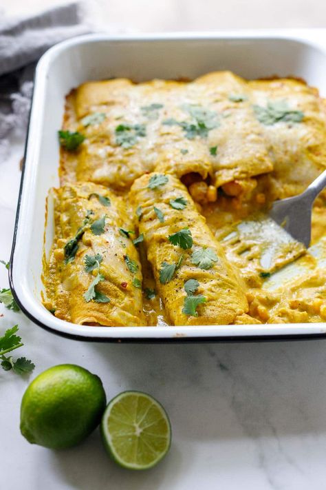 A delicious recipe for Shrimp Enchiladas, filled with tender garlic shrimp, sweet corn, and lime zest, lathered in a flavorful Yellow Mole Sauce. Vegetarian-adaptable Creamy Shrimp Enchiladas, Shrimp Enchiladas Recipes, Shrimp Enchiladas, 2024 Meals, Recipe For Shrimp, Mexican Enchiladas, Feasting At Home, Enchilada Ingredients, Nourishing Food