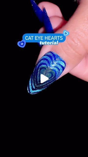 Jeanette Flores on Instagram: "Save this tutorial for nail inspo! ✨🩵💙🩵✨ Blue cat eye heart nails! 🧲🥵💅🏽  Using @dndgel (code: JEN25) •Galactic Sapphire 04 cat eye gel •Cylindrical Cat Eye Magnet •Double Head Cat Eye Magnet •Nail Art Liner Brush 11 •Dotting Tool Set •No Cleanse Top Coat  Comment “link” if you want the direct link to this cat eye gel🔗  #nailsofinstagram #nailart #nailinspo #nailreels #nailvideos #satisfying #trending #nailtrends #nailitdaily #nailsoftheday #pressonnails #uñas #uñasholograficas #flashnails #vdaynails #heartnails #bluenails #cateyenails #velvetnails #valentinesnails #magneticnails #viralnails #dndgelpolish #dndgel #howto #diynails #nailtutorial #tutorial #nailarttutorial" Cateyes Nails Design Short, Nails Acrylic Cat Eye, Magnetic Cat Eye Nails, Heart Cat Eye Nails, Cat Eye Nails With Design, Eye Heart Nails, Matte Cat Eye Nails, Cat Eye Gel Nail Designs, Cats Eyes Nails