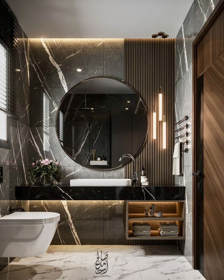 a modern bathroom with marble walls and flooring