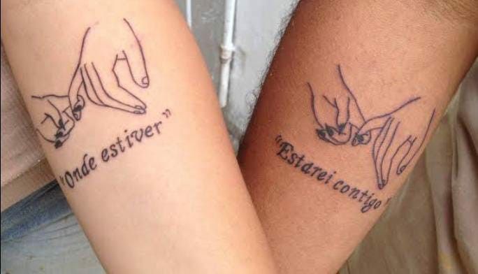 two people with tattoos on their arms that say, one is forever and the other is never