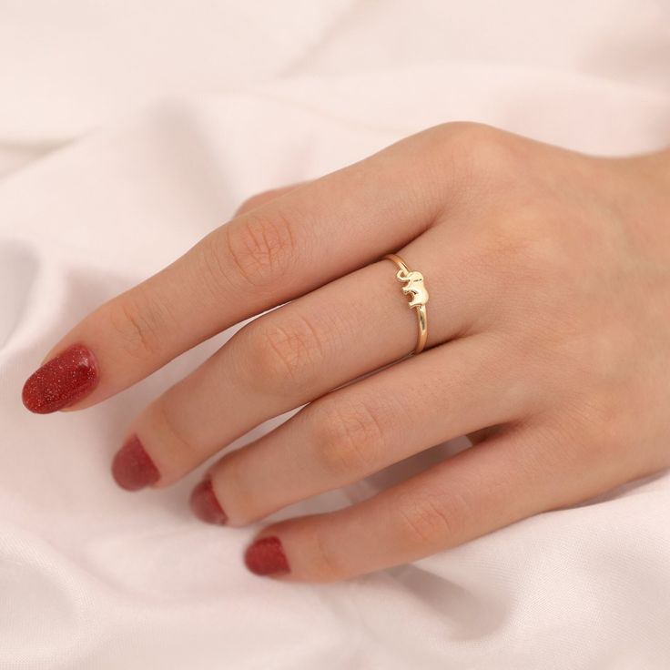 This 14k Gold Elephant Ring is a sign of unity and simply make you feel the pureness love. One of the best meaningful gift for your family and friends... ◖ A B O U T ◗ The elephant animal is typically regarded as a sign of luck and is a symbol of good fortune. Elephant jewelry is a nice present to wish someone luck with something because it is often thought to bring luck to the wearer. ◖ P R O P E R T I E S ◗ * Material: 14k Yellow Gold,14k White Gold ◖ D I O N J E W E L ◗ ‣ 14K REAL GOLD ‣ EXPR Midi Rings For Valentine's Day Gift, Tiny Midi Rings For Valentine's Day Gift, Simple Ring For Valentine's Day Gift, Tiny Stackable Rings For Valentine's Day Gift, Dainty Stackable Rings For Valentine's Day Gift, Delicate Simple Design Birthstone Ring Gift, Tiny Rings For Valentine's Day Gift, Valentine's Day Gift Tiny Stackable Rings, Delicate Heart Ring For Gifts