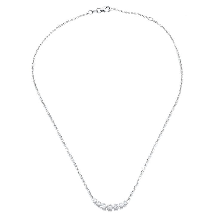 Design The Cinderella Necklace is the ultimate in classic and cool. Seven bezel-set diamonds hanging on a delicate gold chain sit elegantly around your collarbone. That’s right, enjoy your happily ever after with this timeless piece. Details & Dimensions - 0.50 carats- Adjustable 15"-16" chain Elegant Bezel Set Station Necklace, Elegant Bezel Setting Station Necklace, Classic Formal Diamond Necklace With Adjustable Chain, Classic Diamond Necklace With Adjustable Chain For Formal Occasions, Formal Classic Diamond Necklace With Clavicle Chain, Timeless Diamond Necklace With Clavicle Chain For Everyday Luxury, Elegant Cubic Zirconia Station Necklace For Formal Occasions, Classic Diamond Tennis Necklace With Adjustable Chain, Elegant Formal Cubic Zirconia Station Necklace