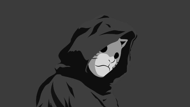 a person wearing a hoodie with a cat on it's face and an angry expression